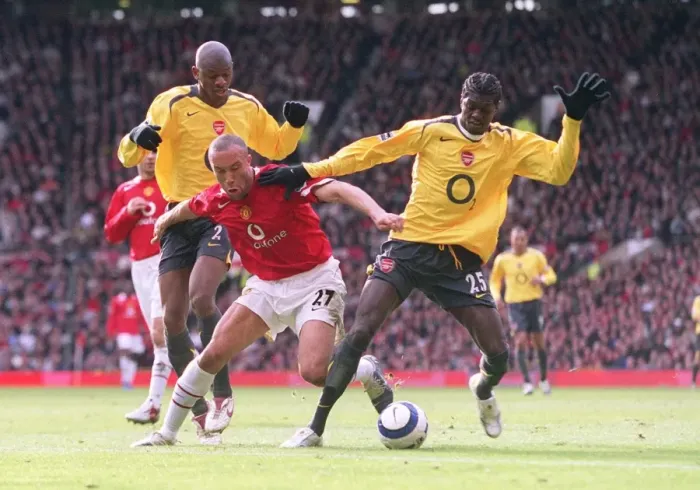 Framed Print : Emmanuel Adebayor and Abou Diaby (Arsenal) Mikael Silvestre (Man Utd) Framed Print : Emmanuel Adebayor and Abou Diaby (Arsenal) Mikael Silvestre (Man Utd)