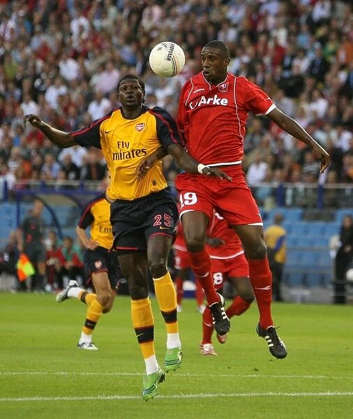 Emmanuel Adebayor (Arsenal) Douglas (FC Twente)