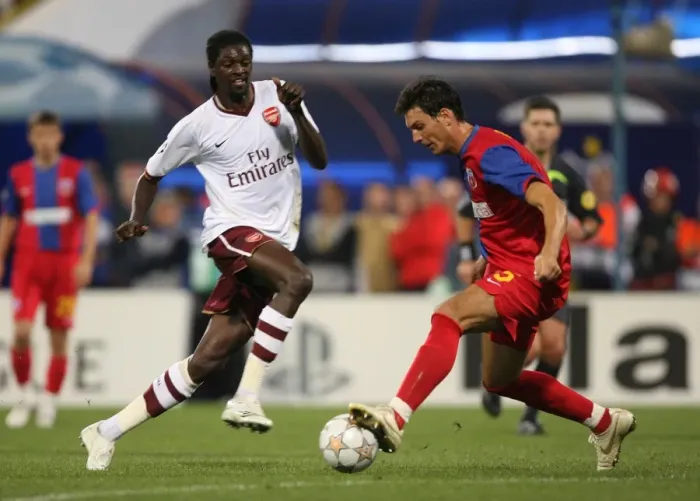 Framed Print : Emmanuel Adebayor (Arsenal) Ionut Rada (Steaua) Framed Print : Emmanuel Adebayor (Arsenal) Ionut Rada (Steaua)
