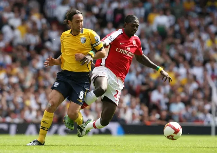Framed Print : Emmanuel Adebayor (Arsenal) Jonathan Greening (WBA)