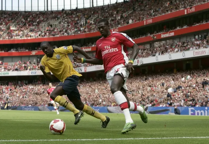 Framed Print : Emmanuel Adebayor (Arsenal) Leon Barnett (West Brom) Framed Print : Emmanuel Adebayor (Arsenal) Leon Barnett (West Brom)