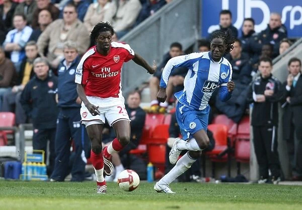 Emmanuel Adebayor (Arsenal) Mario Melchiot (Wigan)