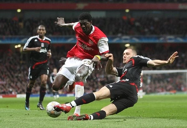 Emmanuel Adebayor (Arsenal) Martin Skrtel (Liverpool)