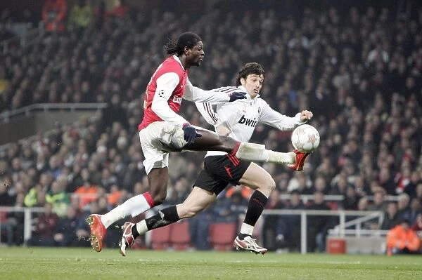 Emmanuel Adebayor (Arsenal) Massimo Osso (Milan)