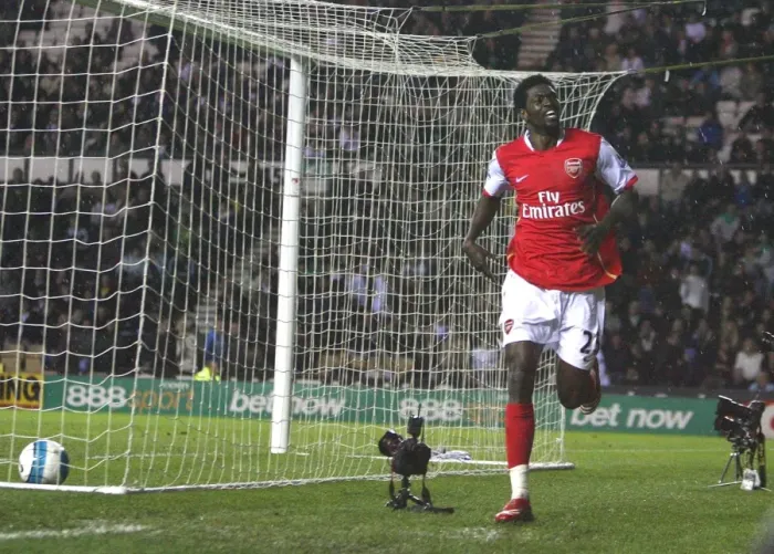 Framed Print : Emmanuel Adebayor celebrates scoring his 3rd and Arsenals 6th goal of the match