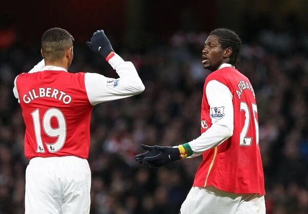 Emmanuel Adebayor celebrates scoring Arsenal and his 2nd goal with Gilberto