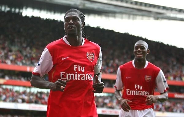 Emmanuel Adebayor celebrates scoring Arsenals 5th goal his 3rd