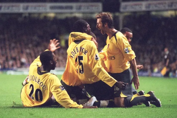 Framed Print : Emmanuel Adebayor celebrates scoring Arsenals goal with Johan Djourou