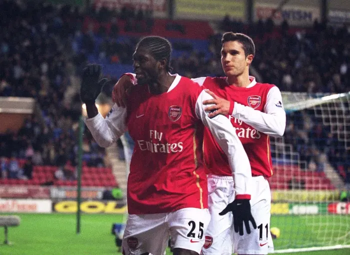 Framed Print : Emmanuel Adebayor celebrates scoring Arsenals goal with Robin van Persie