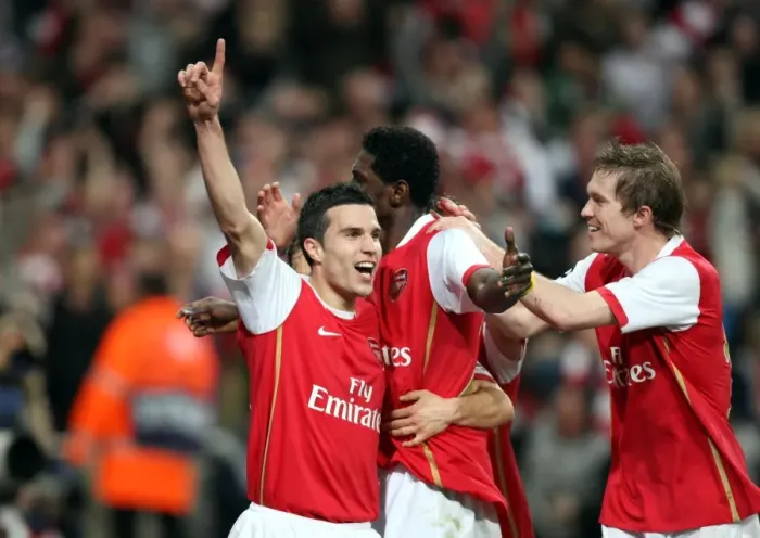 Framed Print : Emmanuel Adebayor celebrates scoring Arsenals goal with Robin van Persie
