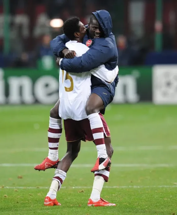 Framed Print : Emmanuel Adebayor and Emmanuel Eboue celebrate Arsenals victory Framed Print : Emmanuel Adebayor and Emmanuel Eboue celebrate Arsenals victory