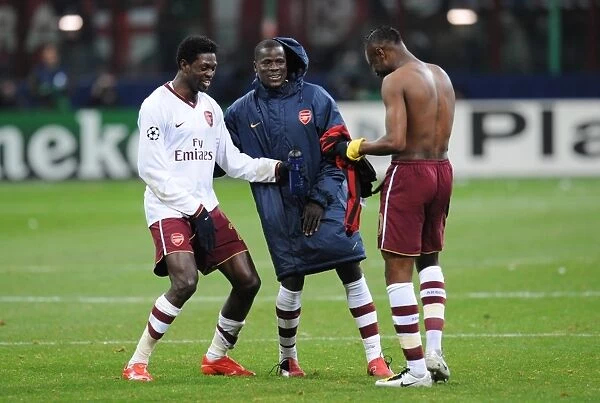 Emmanuel Adebayor, Emmanuel Eboue and William Gallas celebrate Arsenals victory