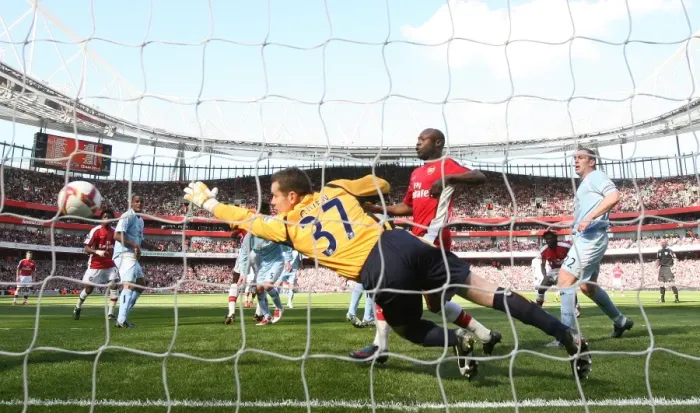 Framed Print : Emmanuel Adebayor heads past Shay Given to score the 1st Arsenal goal Framed Print : Emmanuel Adebayor heads past Shay Given to score the 1st Arsenal goal