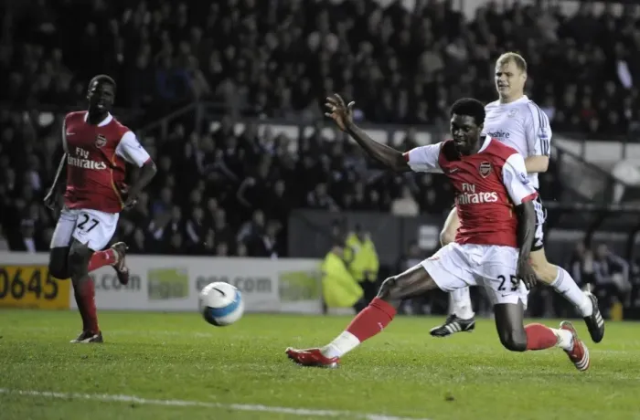 Framed Print : Emmanuel Adebayor shoots past Derby goalkeeper Roy Carroll to score his 2nd Framed Print : Emmanuel Adebayor shoots past Derby goalkeeper Roy Carroll to score his 2nd