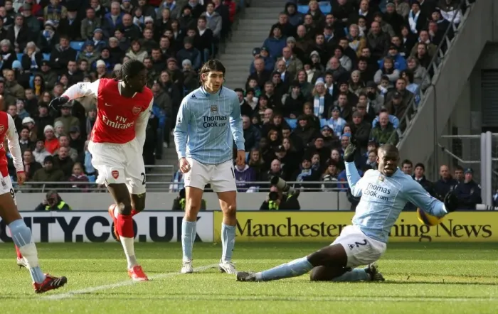 Framed Print : Emmanuel Adebayor shoots past Micah Richards to score the 1st Arsenal goal Framed Print : Emmanuel Adebayor shoots past Micah Richards to score the 1st Arsenal goal
