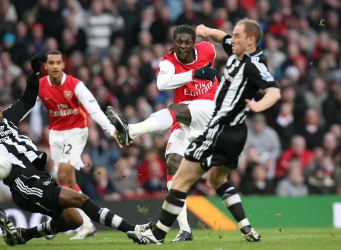 Framed Print : Emmanuel Adebayor shoots past Nicky Butt and Claudio Cacapa to score the 1st Arsenal goal Framed Print : Emmanuel Adebayor shoots past Nicky Butt and Claudio Cacapa to score the 1st Arsenal goal