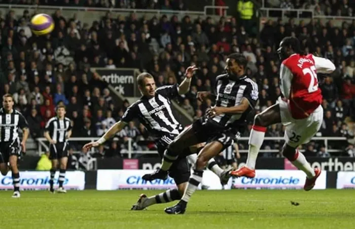 : Emmanuel Adebayor shoots past Shay Given to score the Arsenal goal : Emmanuel Adebayor shoots past Shay Given to score the Arsenal goal