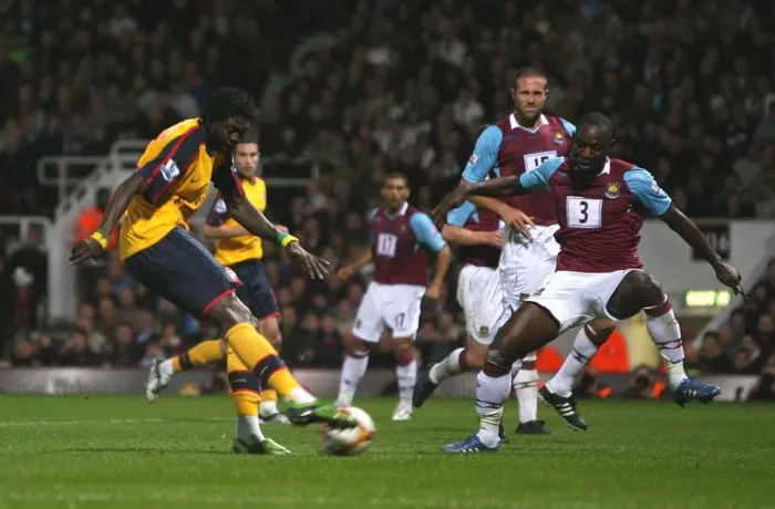 Framed Print : Emmanuel Adebayors shot hits West Hams Julien Flaubert Framed Print : Emmanuel Adebayors shot hits West Hams Julien Flaubert
