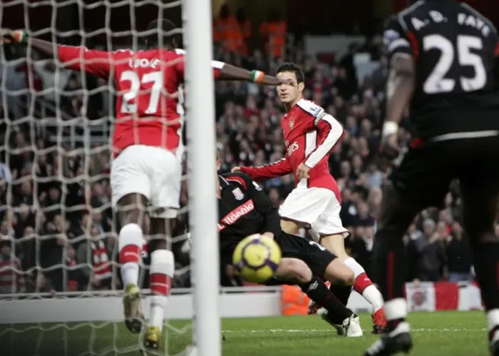 Framed Print : Emmanuel Eboue (Arsenal) accidentally blocks a goalbound shoot from Cesc Fabregas Framed Print : Emmanuel Eboue (Arsenal) accidentally blocks a goalbound shoot from Cesc Fabregas
