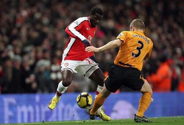 Emmanuel Eboue (Arsenal) Andy Dawson (Hull). Arsenal 3: 0 Hull City. Barclays Premier League
