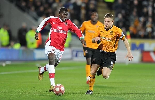 Emmanuel Eboue (Arsenal) Andy Dawson (Hull). Hull City 1: 2 Arsenal, Barclays Premier League