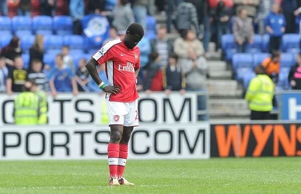 Emmanuel Eboue (Arsenal) dejected after the match. Wigan Athletic 3:2 Arsenal