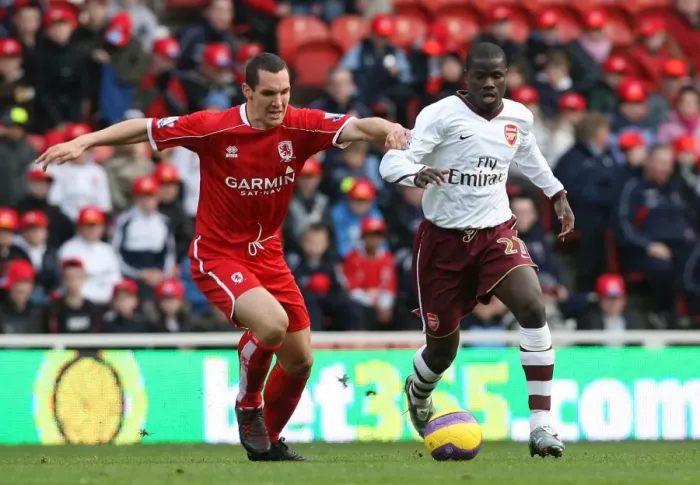 Framed Print : Emmanuel Eboue (Arsenal) Emanuel Pogatetz (Middlesbrough)