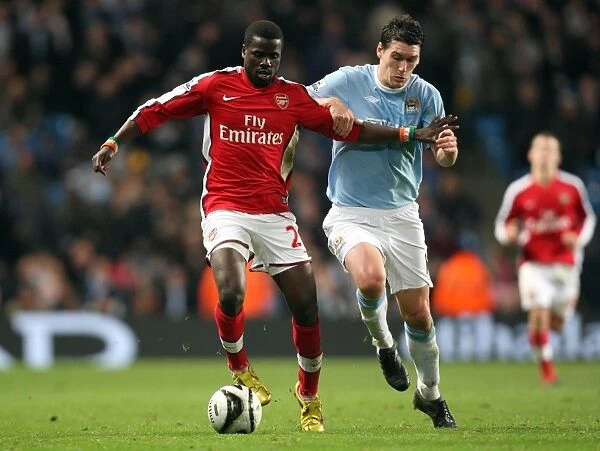 Emmanuel Eboue (Arsenal) Gareth Barry (Man City). Manchester City 3: 0 Arsenal