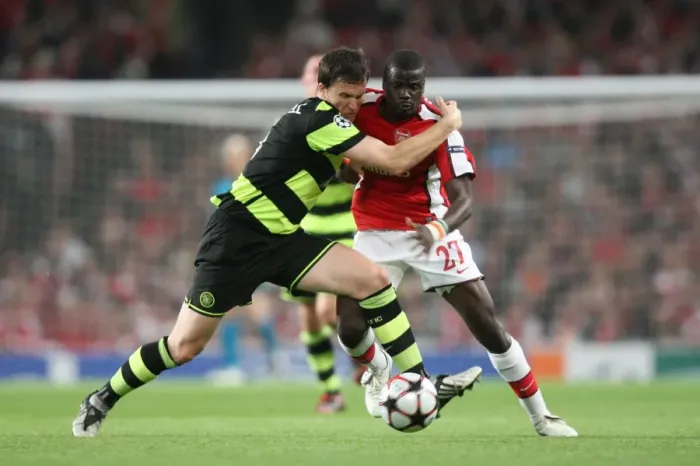 Framed Print : Emmanuel Eboue (Arsenal) Gary Caldwell (Celtic) Framed Print : Emmanuel Eboue (Arsenal) Gary Caldwell (Celtic)