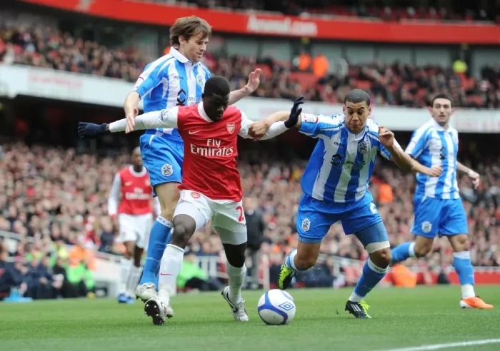 Framed Print : Emmanuel Eboue (Arsenal) Lee Peltier and Kevin Kilbane (Huddersfield). Arsenal 2 Framed Print : Emmanuel Eboue (Arsenal) Lee Peltier and Kevin Kilbane (Huddersfield). Arsenal 2