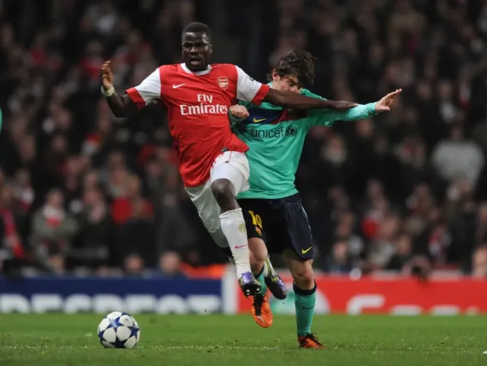 Framed Print : Emmanuel Eboue (Arsenal) Lionel Messi (Barcelona). Arsenal 2: 1 Barcelona Framed Print : Emmanuel Eboue (Arsenal) Lionel Messi (Barcelona). Arsenal 2: 1 Barcelona