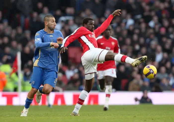 Framed Print : Emmanuel Eboue (Arsenal) Nadir Belhadj (Portsmouth) Framed Print : Emmanuel Eboue (Arsenal) Nadir Belhadj (Portsmouth)