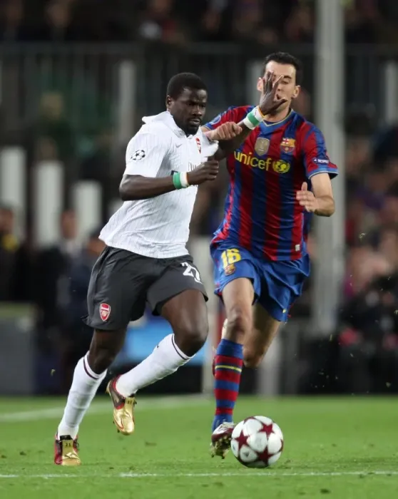 Framed Print : Emmanuel Eboue (Arsenal) Sergio Basquets (Barcelona). Barcelona 4: 1 Arsenal