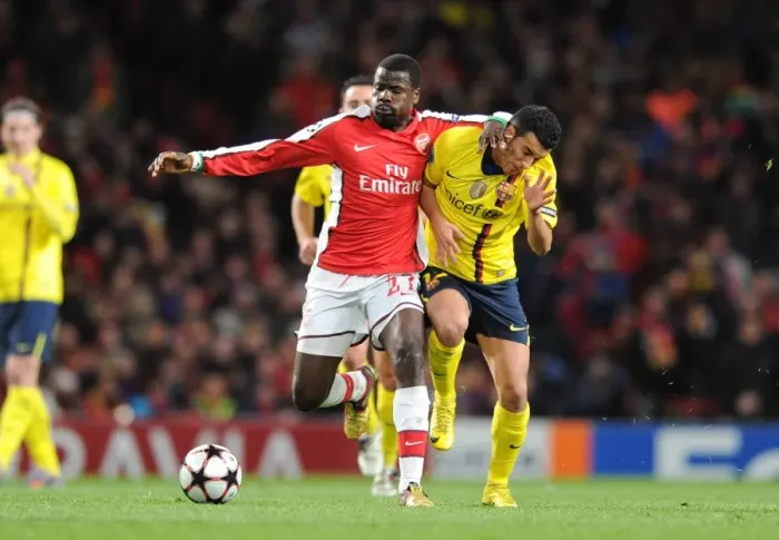 Framed Print : Emmanuel Eboue (Arsenal) Sergio Busquets (Barcelona). Arsenal 2: 2 Barcelona Framed Print : Emmanuel Eboue (Arsenal) Sergio Busquets (Barcelona). Arsenal 2: 2 Barcelona