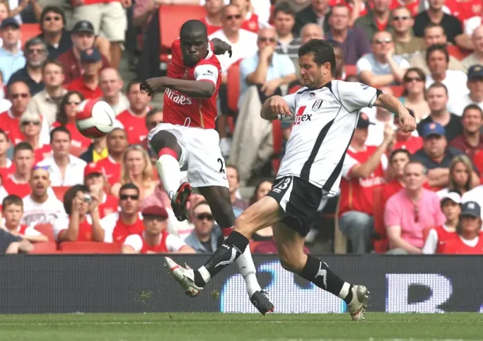 Framed Print : Emmanuel Eboue (Arsenal) Tomaz Radzinski (Fulham) Framed Print : Emmanuel Eboue (Arsenal) Tomaz Radzinski (Fulham)