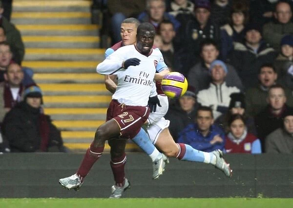 Emmanuel Eboue (Arsenal) Wilfred Bouma (Aston Villa)