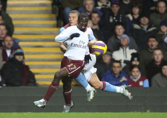 Framed Print : Emmanuel Eboue (Arsenal) Wilfred Bouma (Aston Villa) Framed Print : Emmanuel Eboue (Arsenal) Wilfred Bouma (Aston Villa)