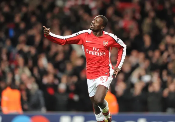 Framed Print : Emmanuel Eboue celebrates scoring the 4th Arsenal goal. Arsenal 5: 0 FC Porto