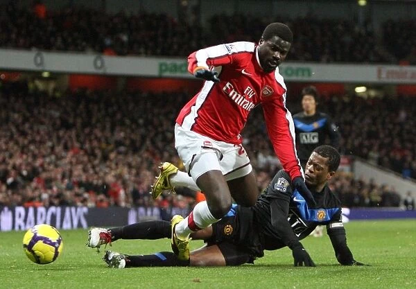 Emmanuel Eboue vs. Patrice Evra: Arsenal vs. Manchester United's Intense Rivalry (31 / 01 / 10)