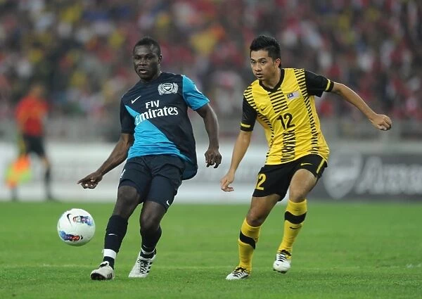 Emmanuel Frimpong (Arsenal) Amar Rohidan (Malaysia). Malaysia XI 0:4 Arsenal