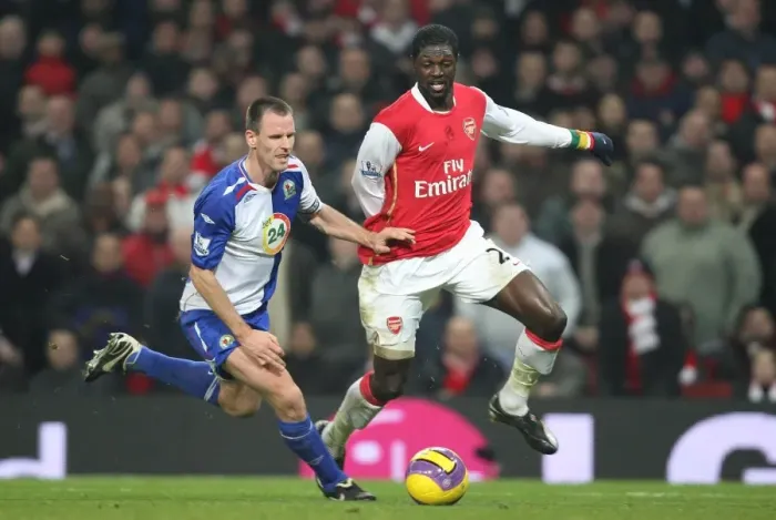 Framed Print : Emmauel Adebayor (Arsenal) Andre Ooijer (Blackburn Rovers)