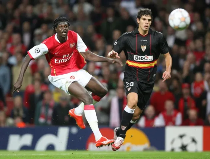 Framed Print : Emmauel Adebayor (Arsenal) Federico Fazio (Sevilla)