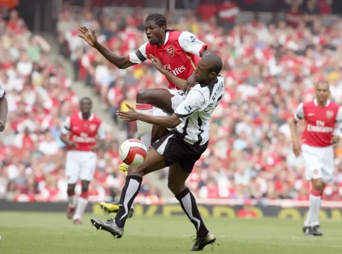 Framed Print : Emmauel Adebayor (Arsenal) Philippe Christval (Fulham)