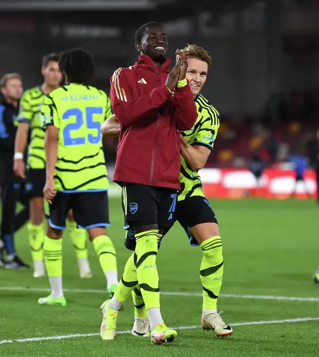 Framed Print : Emotional Reunion: Martin Odegaard and Charles Sagoe Jr after Arsenal's Carabao Cup Victory at Brentford