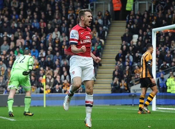 Euphoria Unleashed: Aaron Ramsey's Thrilling Goal Celebration vs. Hull City, Premier League 2013-2014