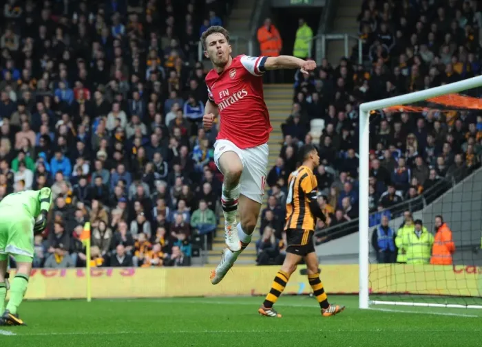Framed Print : Euphoria Unleashed: Aaron Ramsey's Thrilling Goal Celebration vs. Hull City, Premier League 2013-2014 Framed Print : Euphoria Unleashed: Aaron Ramsey's Thrilling Goal Celebration vs. Hull City, Premier League 2013-2014