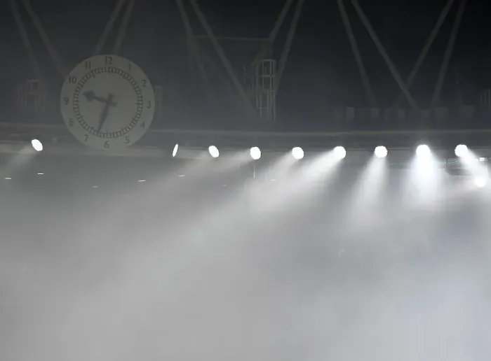 Framed Print : Europa League: Smoke-Filled Clock End as Arsenal Battle FC Zurich at Emirates Stadium