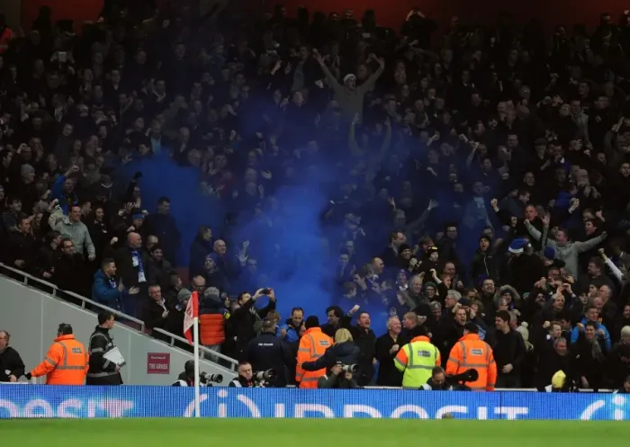 Framed Print : Everton fans let off a blue flare. Arsenal 1: 1 Everton. Barclays Premier League. Emirates Stadium Framed Print : Everton fans let off a blue flare. Arsenal 1: 1 Everton. Barclays Premier League. Emirates Stadium