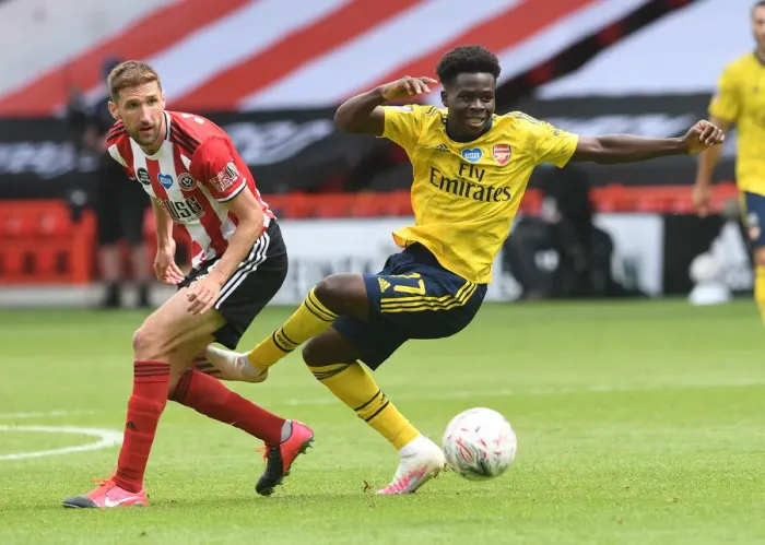 Framed Print : FA Cup Quarterfinal: Bukayo Saka Fouls by Chris Basham - Sheffield United vs. Arsenal