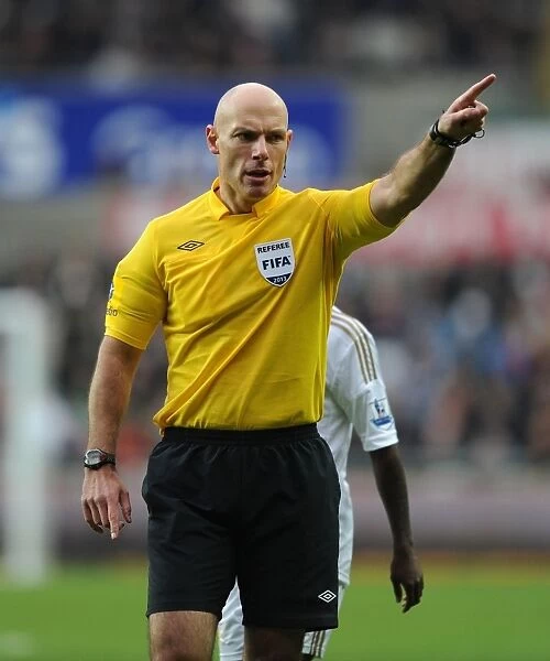FA Cup Third Round: Swansea vs. Arsenal - Referee Howard Webb Overssees the Action